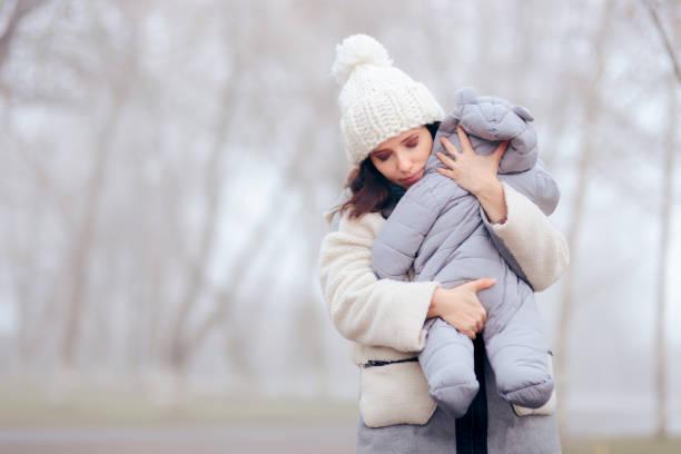 Зимний комбинезон для ребенка в год: правильное время для ношения